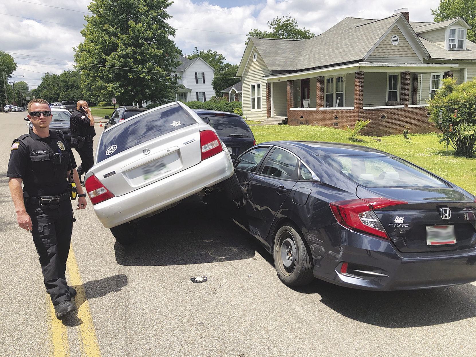 Woman crashes car texting while driving